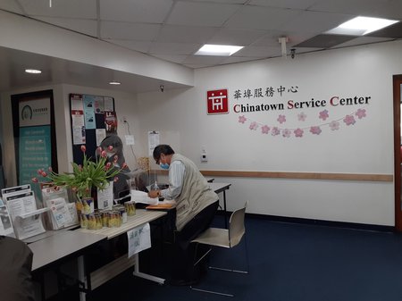 person working at the Chinatown Service Center