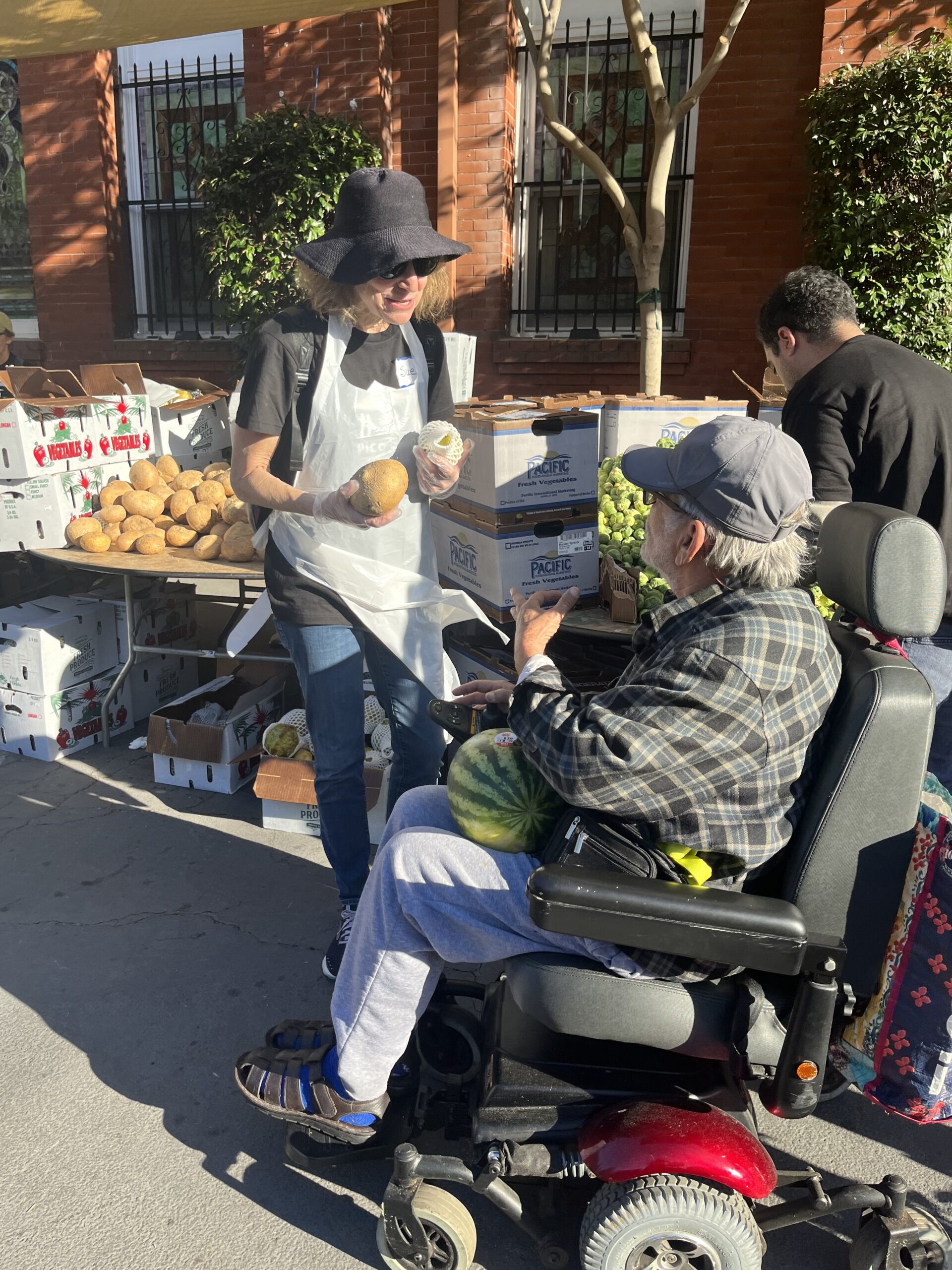 woman giving food to man