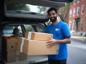 guy with boxes of food
